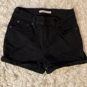 Levi’s black denim mid length shorts.